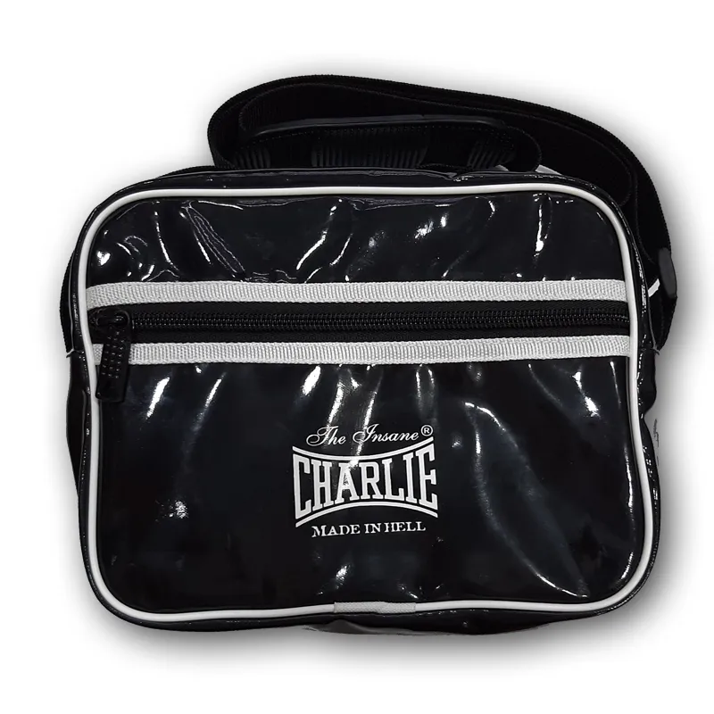bolso-vintage-mini-negro-de-charlie-boxing-21x15x8-cm-polipiel-con-brillo-y-band image 1