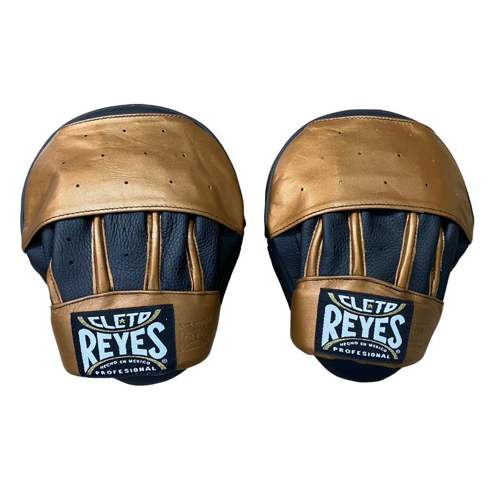 cleto-reyes-manillas-en-piel-de-res-curvas-para-golpes-cobrizo-negro image 1